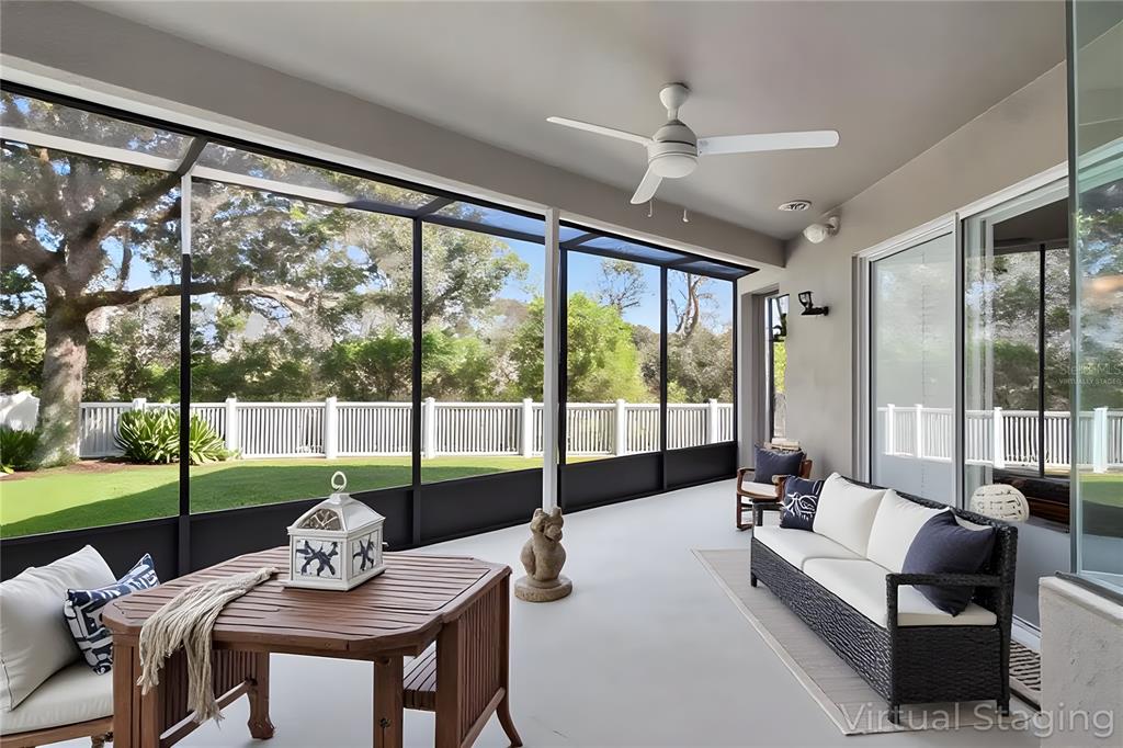 1835 Regal Mist Loop Trinity, FL 34655 - Photo 49 of 55 a living room with furniture and a large window
