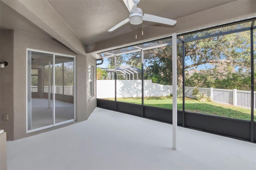 1835 Regal Mist Loop Trinity, FL 34655 - Photo 51 of 55 a view of an empty room with glass door