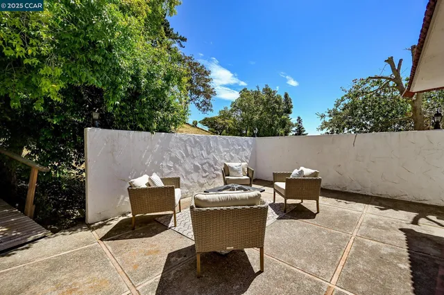 a view of yard from outdoor seating