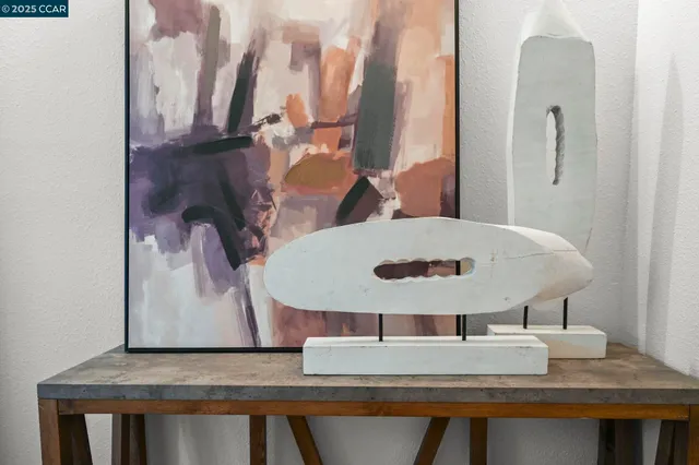 a room with a table and chairs