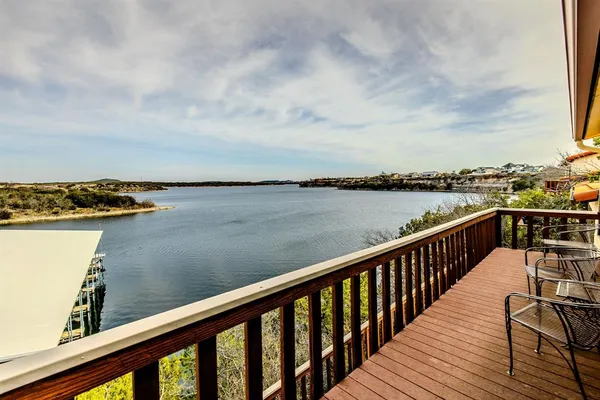 a view of a balcony with an outdoor space