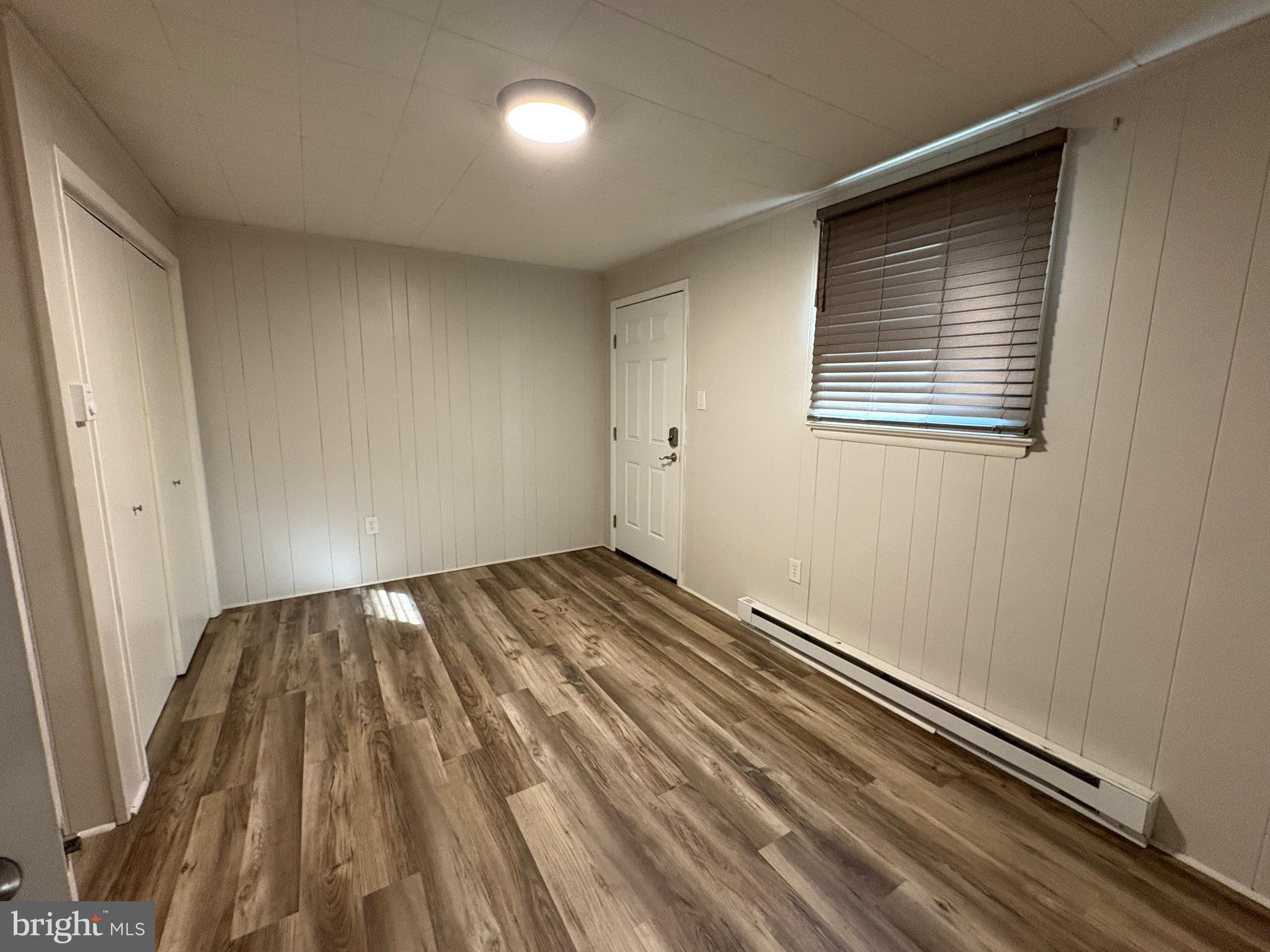 1056 Dual Place, Unit 4 Hagerstown, MD 21740 - Photo 3 of 6 a view of a room with wooden floor