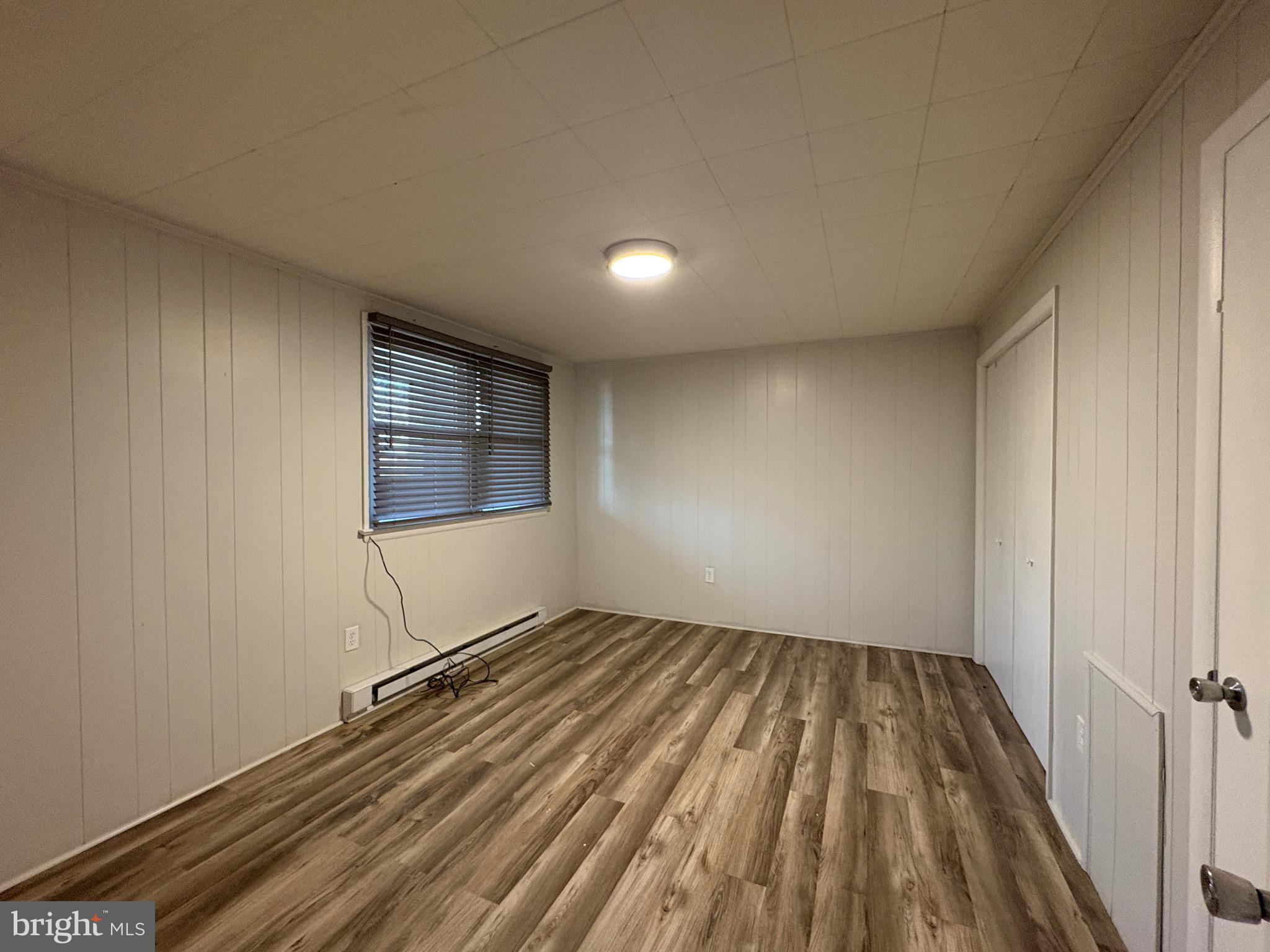 1056 Dual Place, Unit 4 Hagerstown, MD 21740 - Photo 5 of 6 a view of wooden floor in an empty room