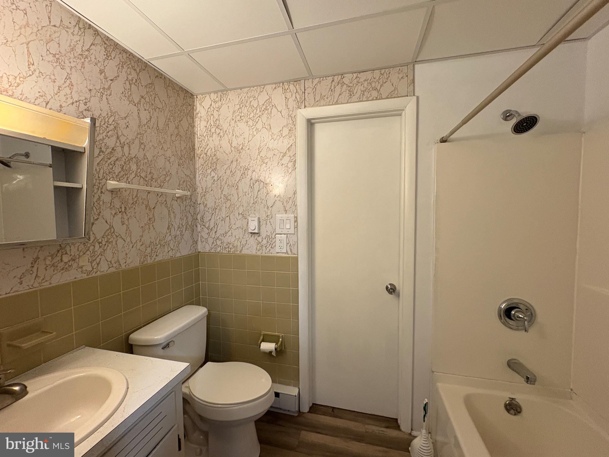 1056 Dual Place, Unit 4 Hagerstown, MD 21740 - Photo 6 of 6 a bathroom with a toilet a sink and shower