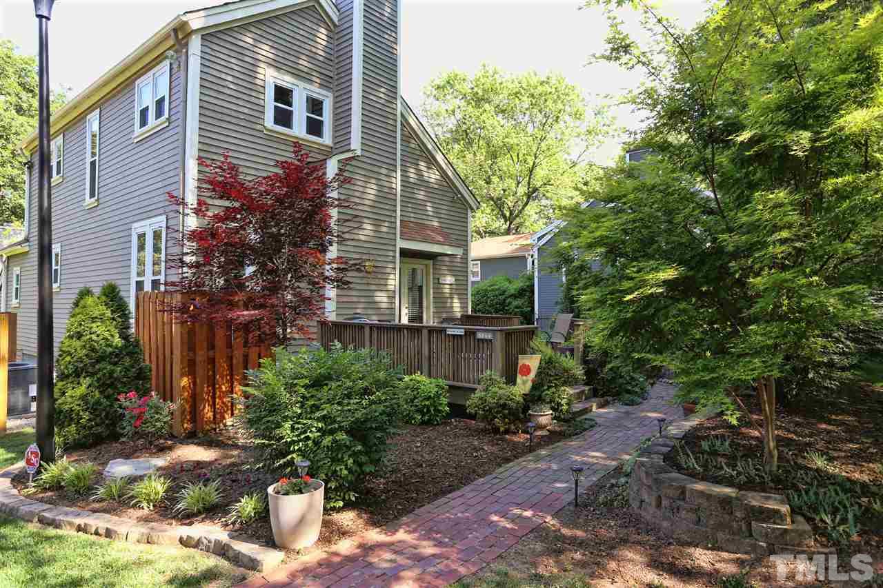 5944 Sentinel Drive Raleigh, NC 27609 - Photo 3 of 24 a view of a house with a yard