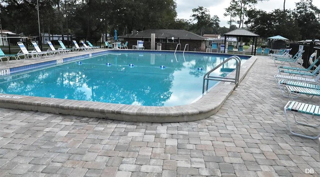 2092 Culbreath Road, Unit C52 Brooksville, FL 34602 - Photo 27 of 33 swimming pool view