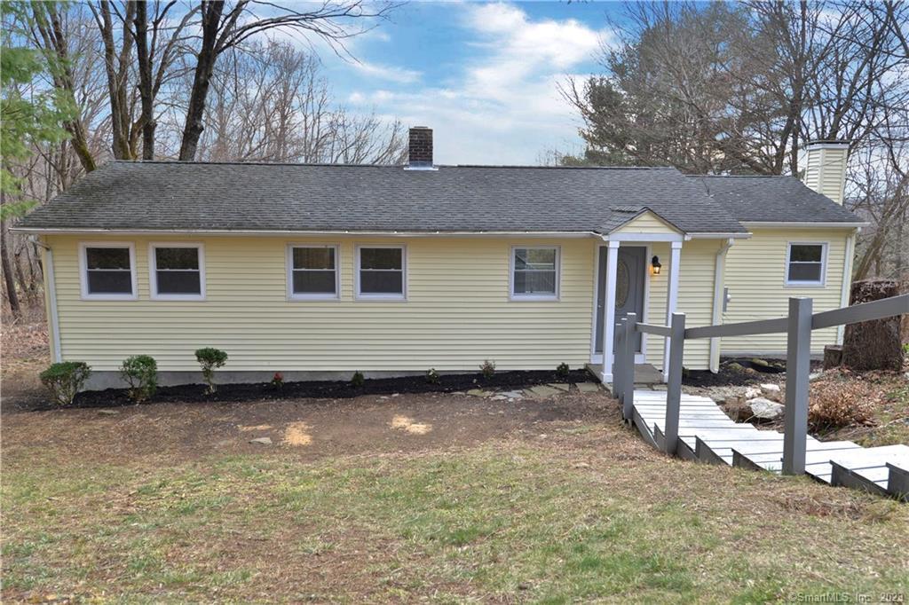 98 Lillis Road New Milford, CT 06776 - Photo 1 of 1 a backyard of a house