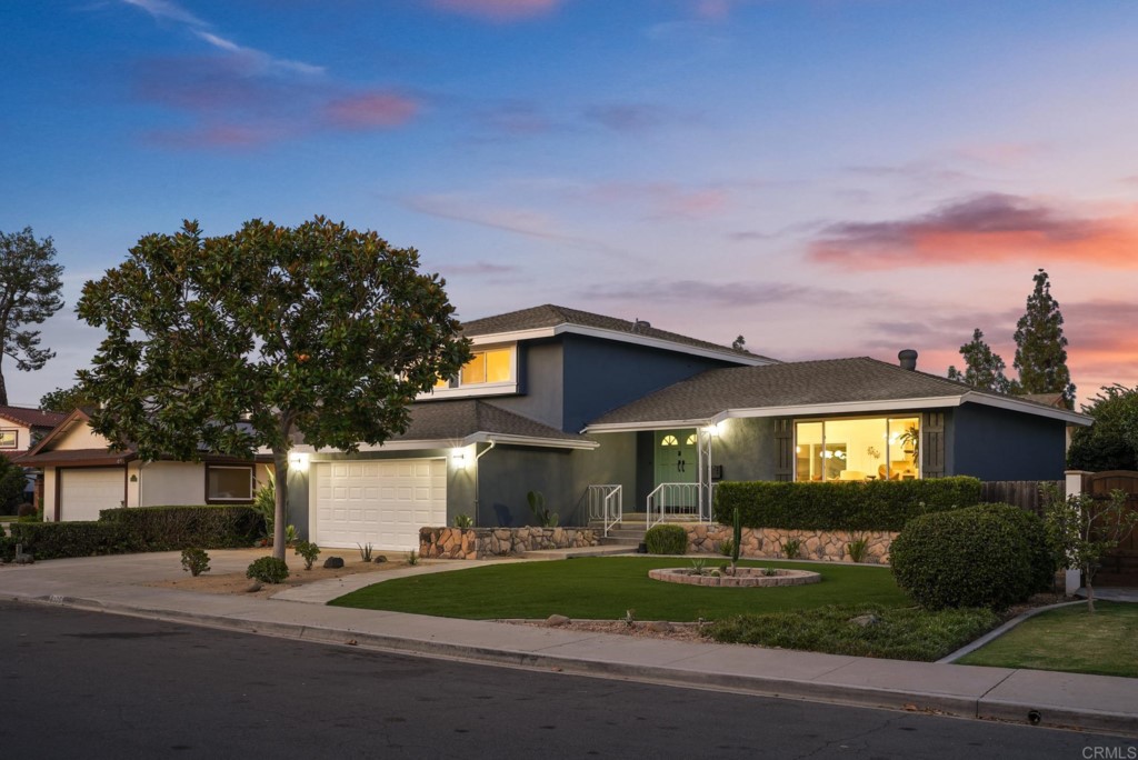 6125 Laport Street La Mesa, CA 91942 - Photo 1 of 32 a front view of a house with a yard and garage
