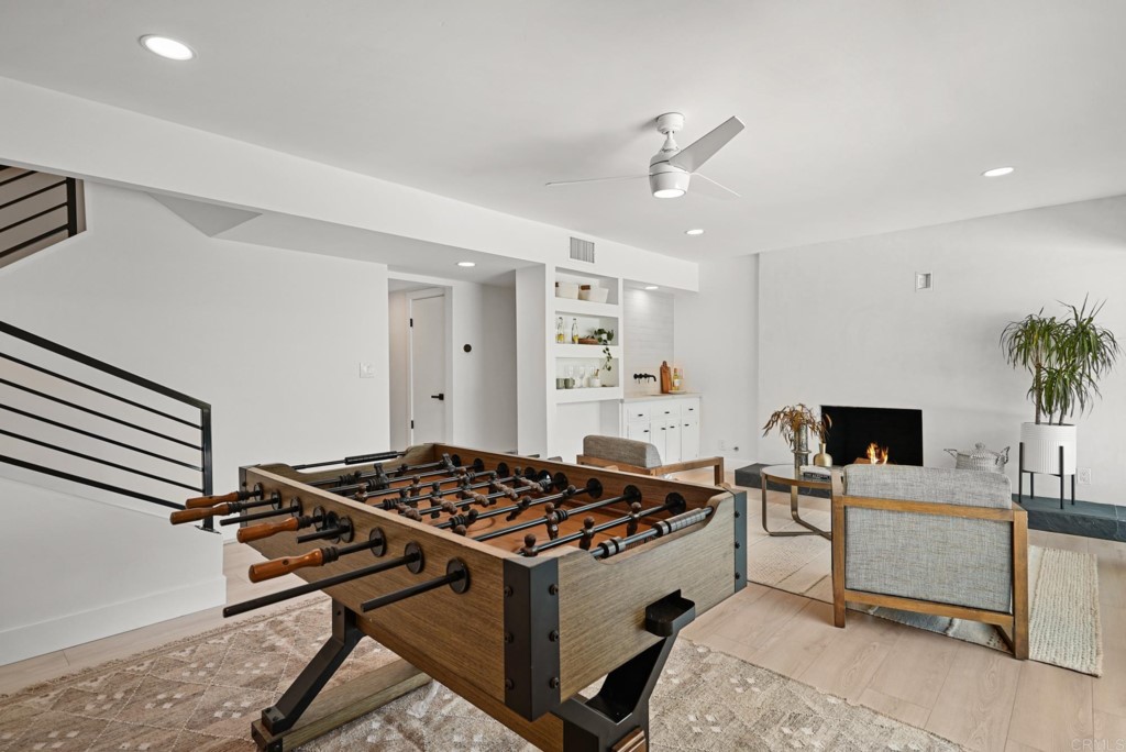 6125 Laport Street La Mesa, CA 91942 - Photo 18 of 32 a kitchen with a stove and a refrigerator