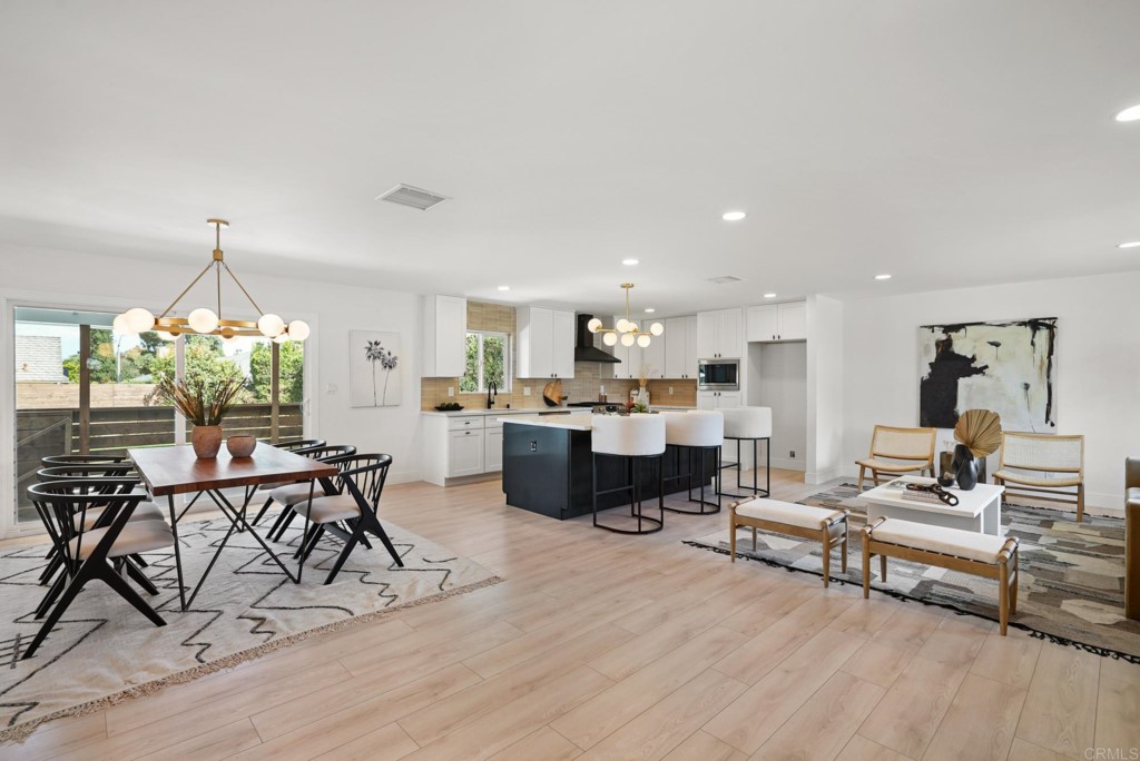 6125 Laport Street La Mesa, CA 91942 - Photo 2 of 32 a living room with furniture and a chandelier