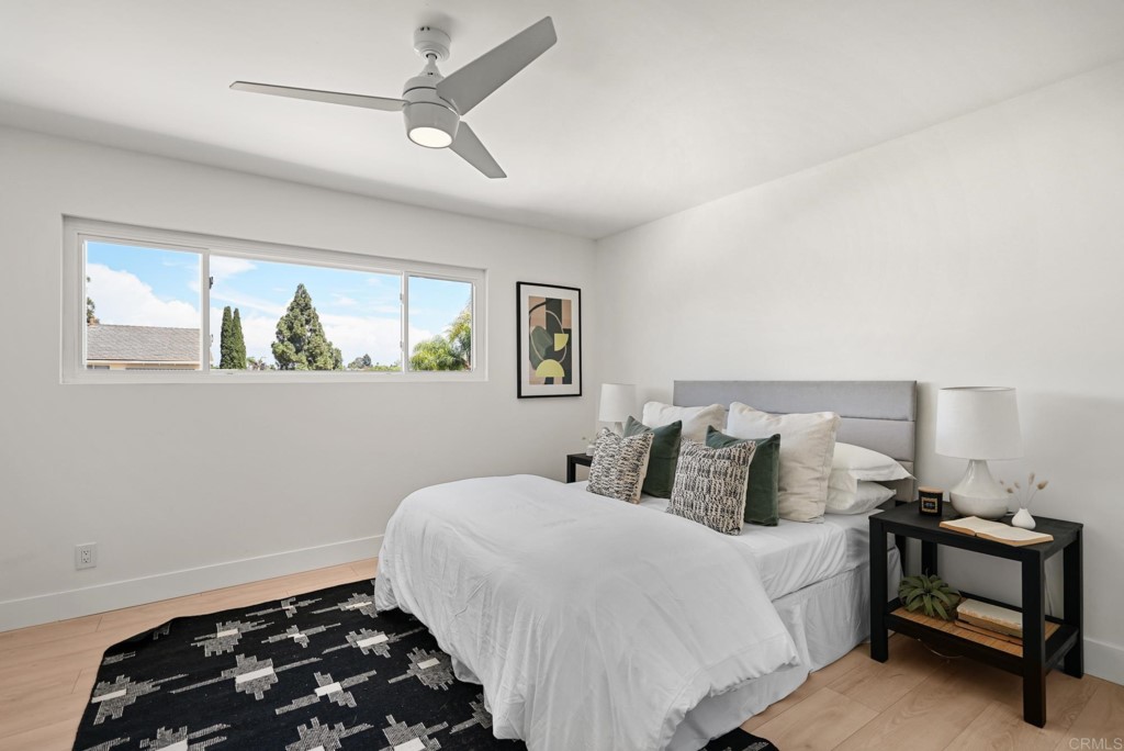 6125 Laport Street La Mesa, CA 91942 - Photo 24 of 32 a bedroom with bed and a window