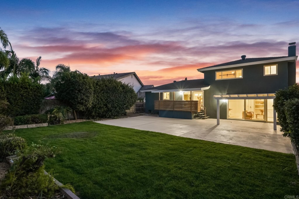 6125 Laport Street La Mesa, CA 91942 - Photo 4 of 32 a view of an house with backyard and a garden