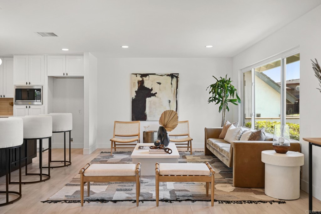 6125 Laport Street La Mesa, CA 91942 - Photo 8 of 32 a living room with furniture and a large window