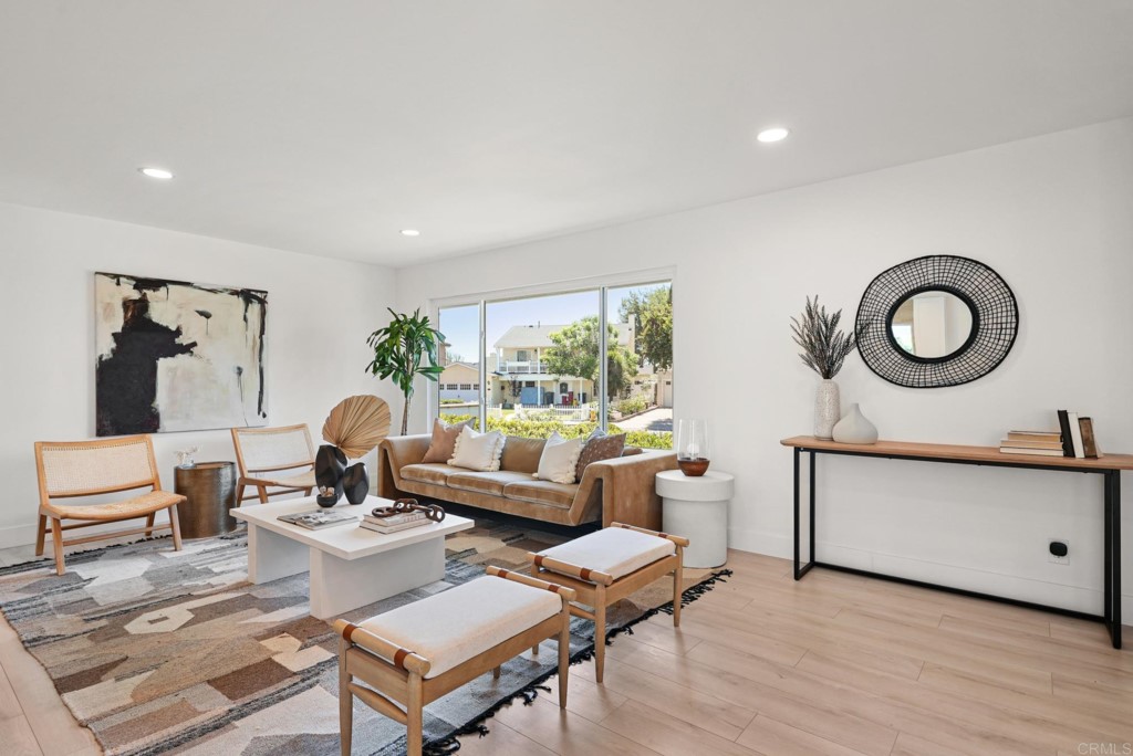 6125 Laport Street La Mesa, CA 91942 - Photo 9 of 32 a living room with furniture a rug and a large window
