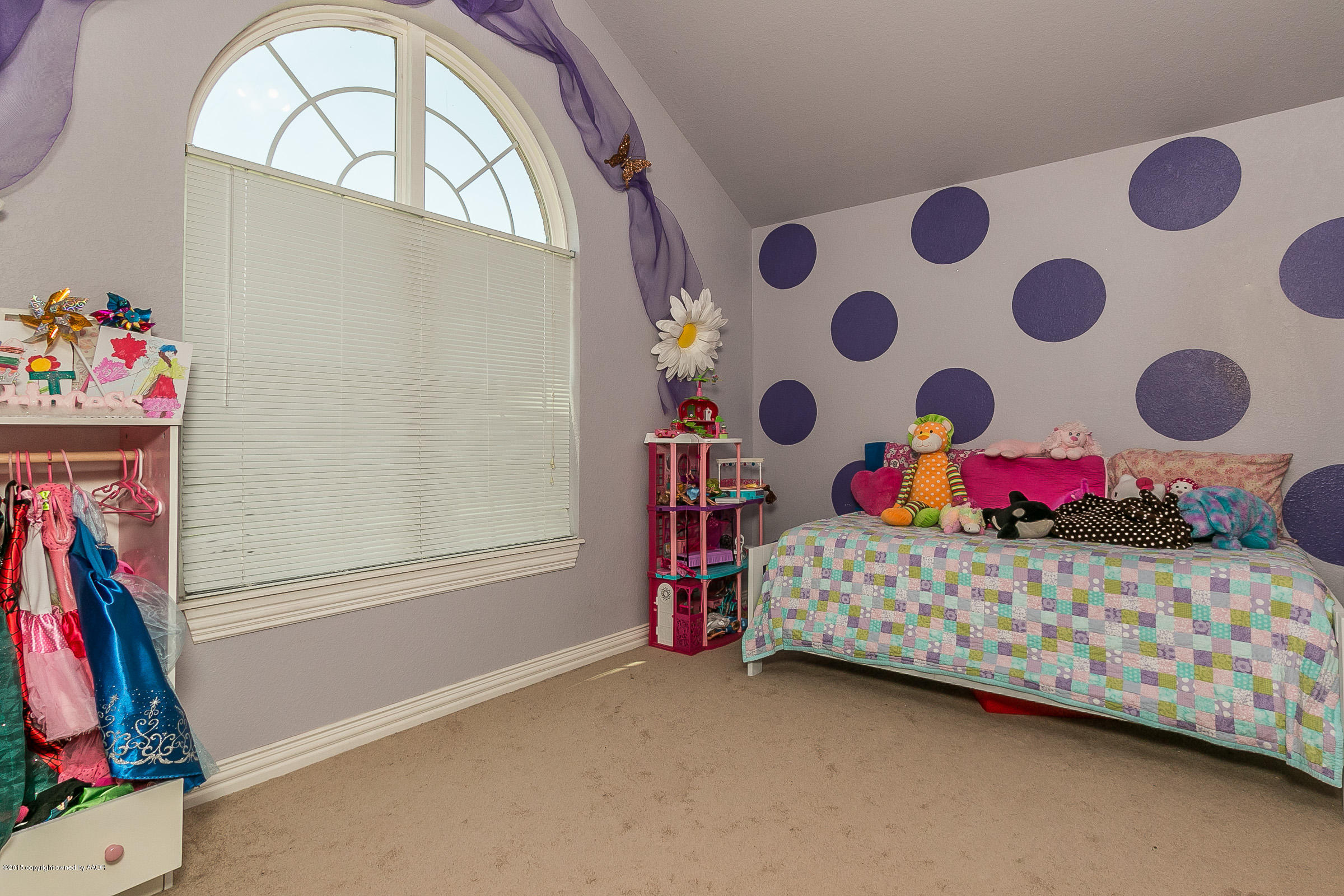 5301 Pleasant Court Amarillo, TX 79110 - Photo 19 of 28 a bedroom with a bed and a window