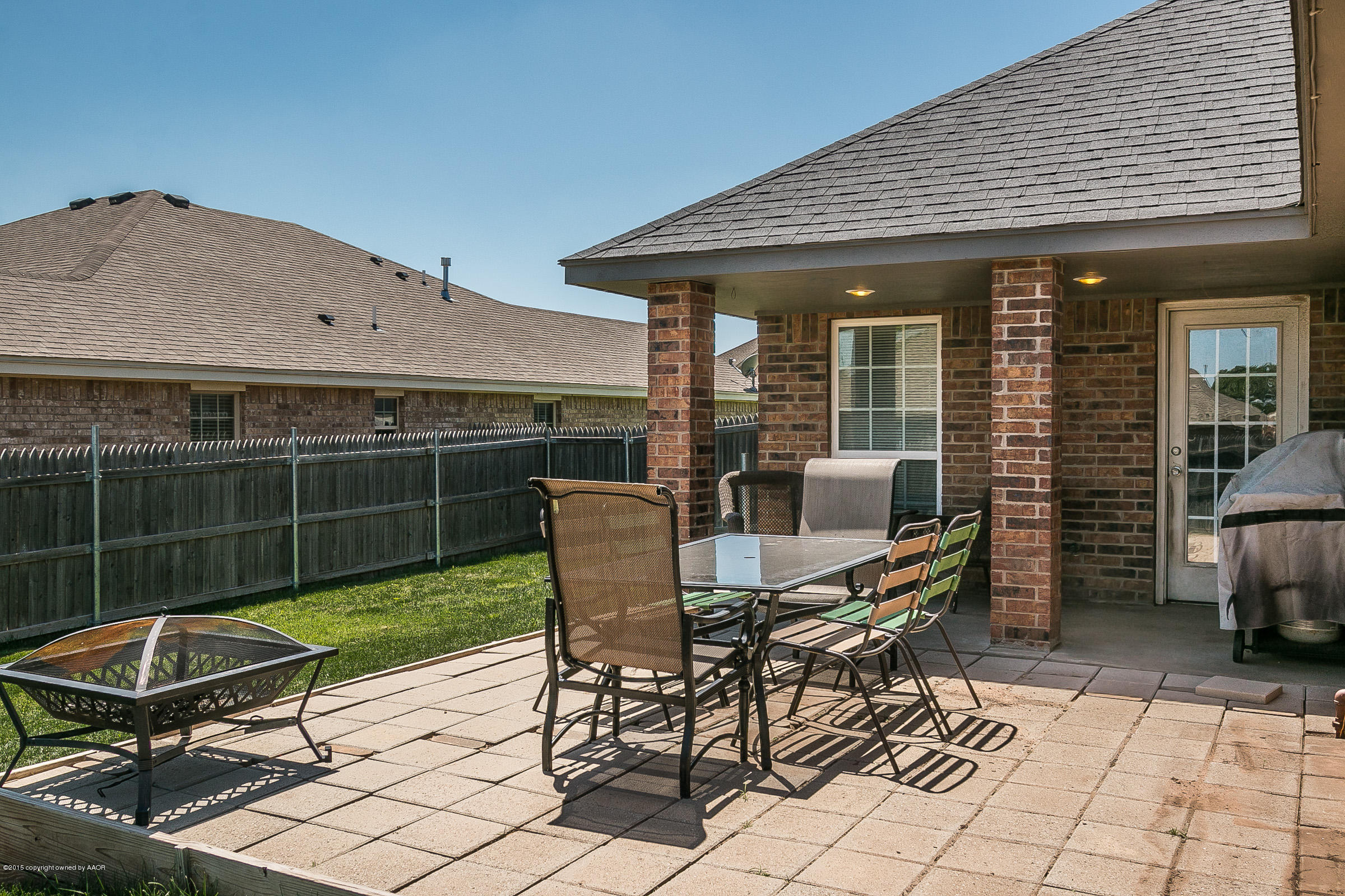 5301 Pleasant Court Amarillo, TX 79110 - Photo 24 of 28 a view of a chairs and table in the patio