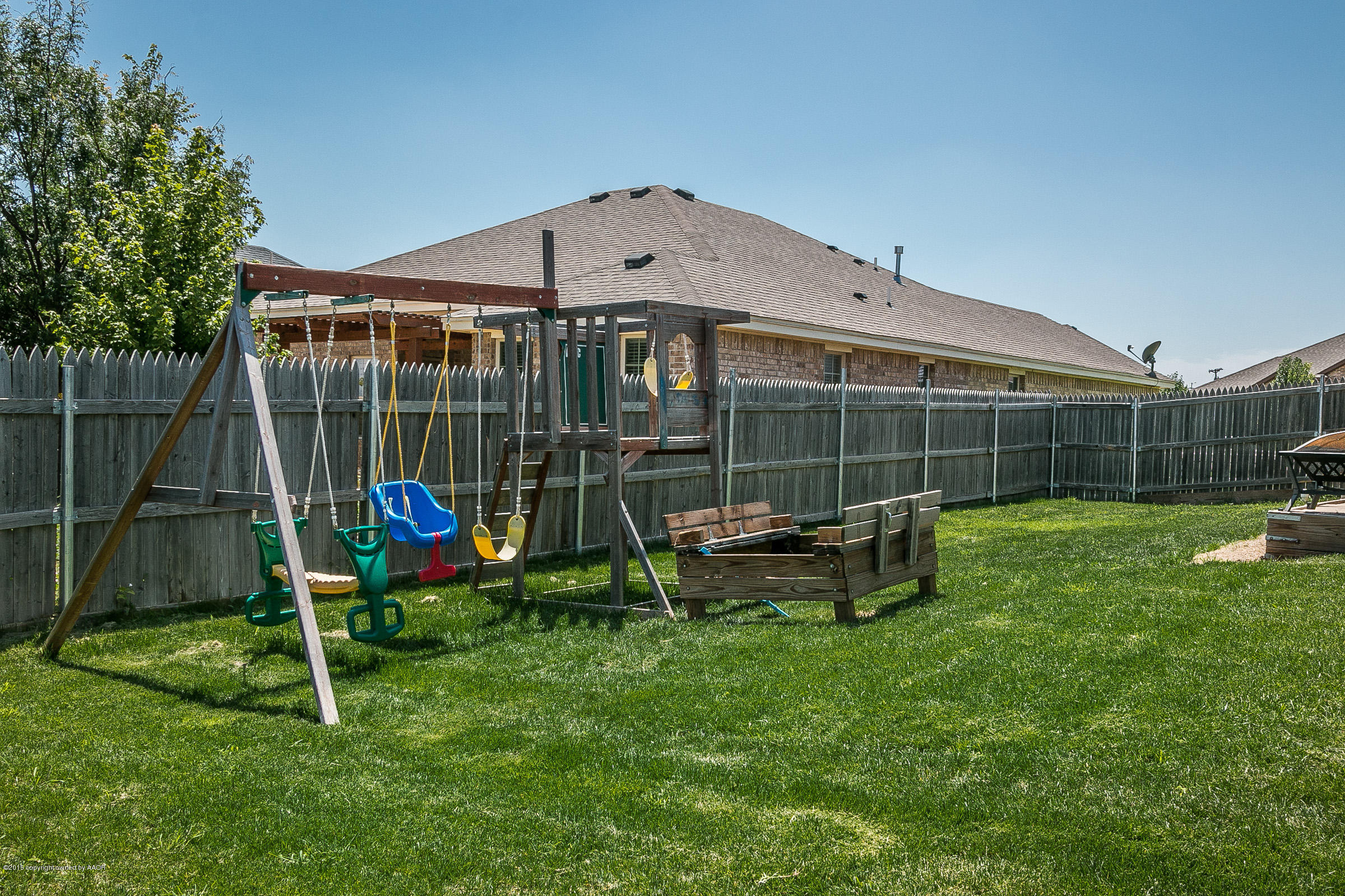 5301 Pleasant Court Amarillo, TX 79110 - Photo 27 of 28 a view of a chair and table in the garden