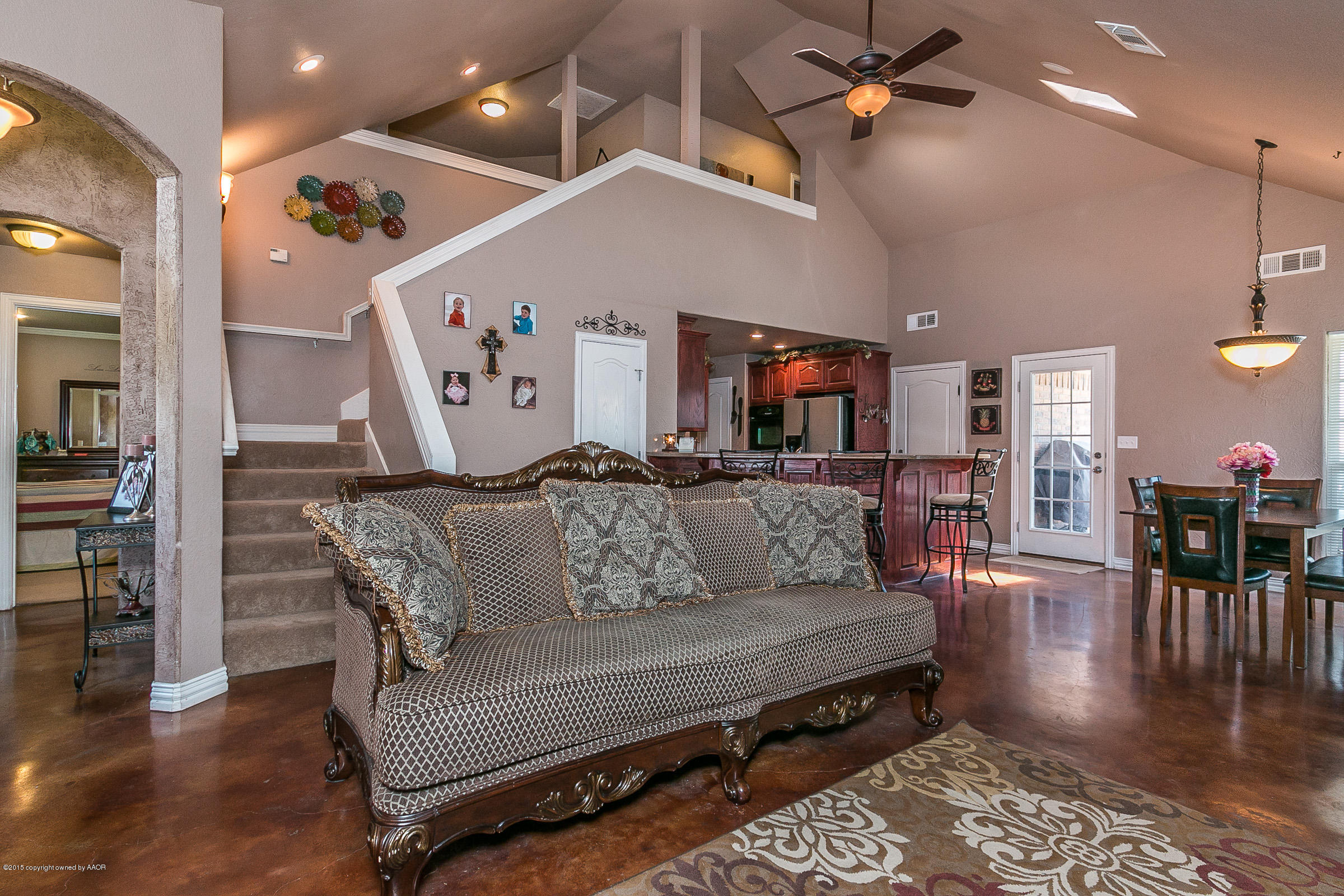 5301 Pleasant Court Amarillo, TX 79110 - Photo 4 of 28 a living room with furniture and wooden floor