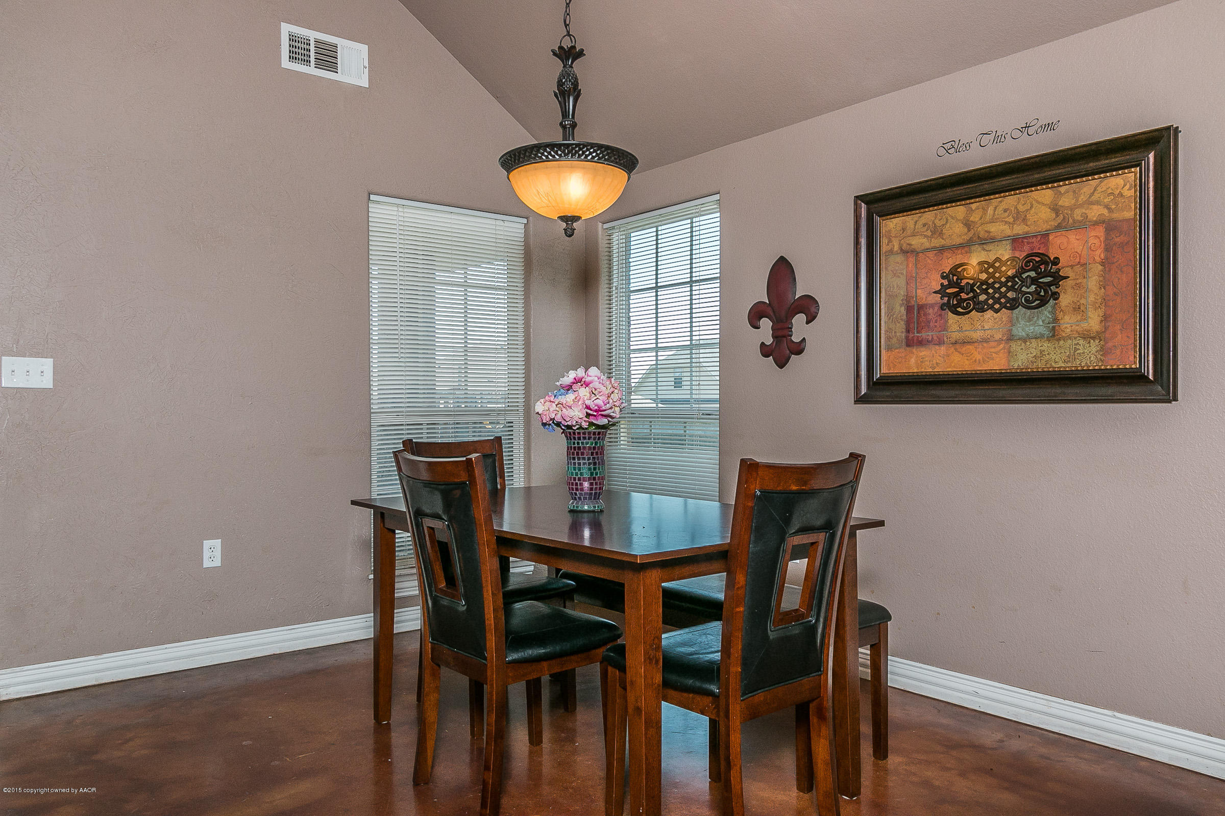 5301 Pleasant Court Amarillo, TX 79110 - Photo 7 of 28 a dining room with furniture and chandelier