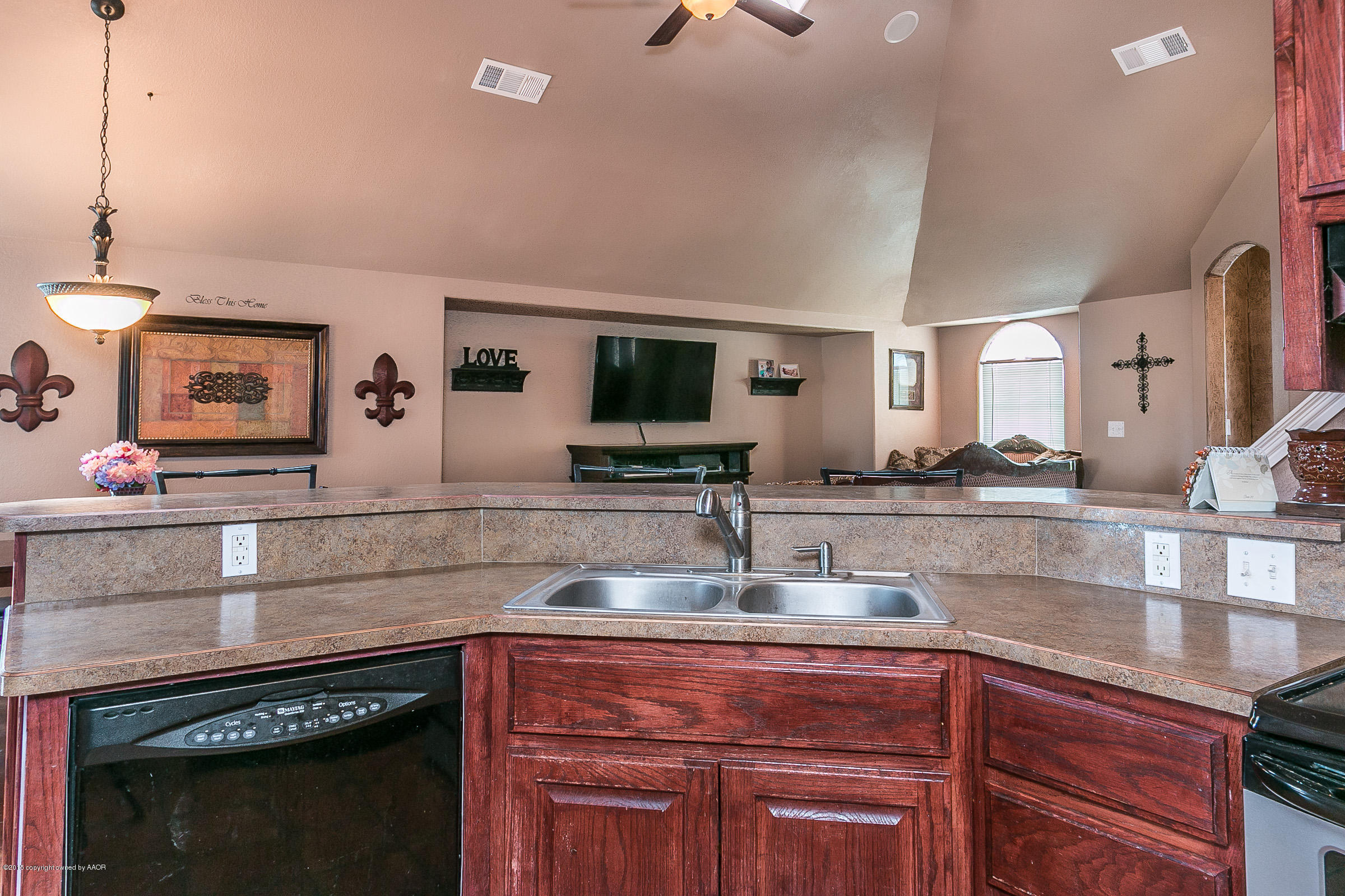 5301 Pleasant Court Amarillo, TX 79110 - Photo 9 of 28 a kitchen with stainless steel appliances granite countertop a stove and a sink