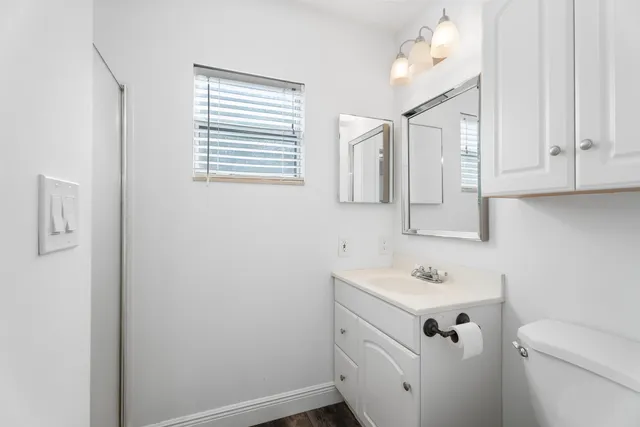 a bathroom with a sink and a vanity