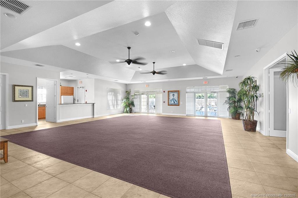 3141 Southwest Porpoise Circle Stuart, FL 34997 - Photo 22 of 45 a view of an empty room with a window and fireplace