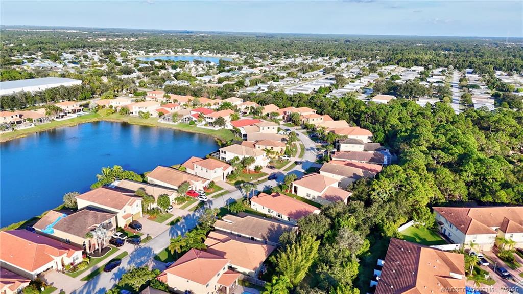 3141 Southwest Porpoise Circle Stuart, FL 34997 - Photo 33 of 45 an aerial view of residential houses with outdoor space