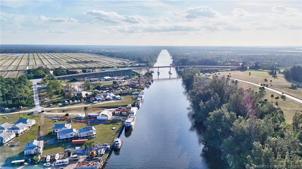 3141 Southwest Porpoise Circle Stuart, FL 34997 - Photo 38 of 45 a view of a city with lots of trees