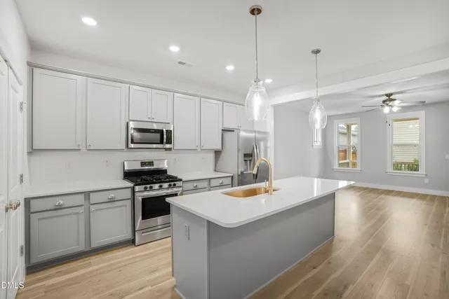 a view of a livingroom with wooden floor
