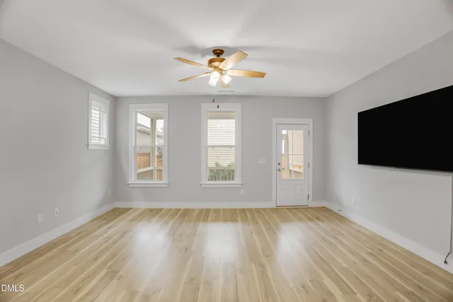 a kitchen with stainless steel appliances a stove a sink and a microwave