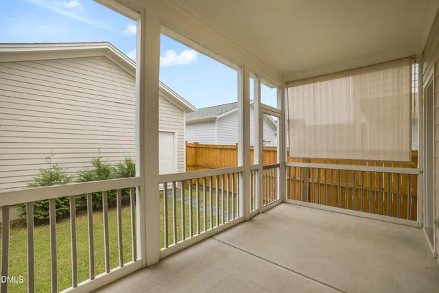 a bathroom with a sink toilet double vanity and shower