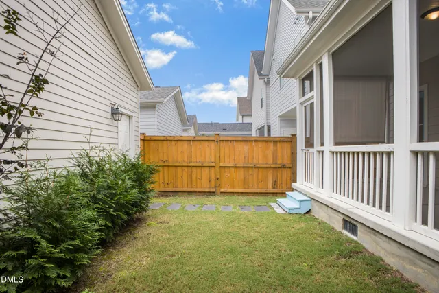 a view of a porch with a floor to ceiling window