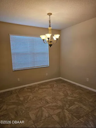 a bathroom with a mirror sink and vanity