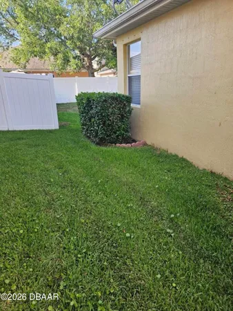 a view of a swimming pool with an outdoor space