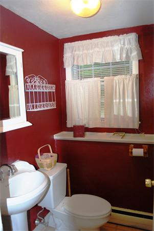 142 Alder Road Westwood, MA 02090 - Photo 12 of 13 a bathroom with a toilet a sink and a large mirror
