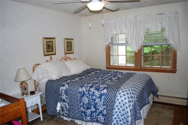 142 Alder Road Westwood, MA 02090 - Photo 5 of 13 a bedroom with bed and window