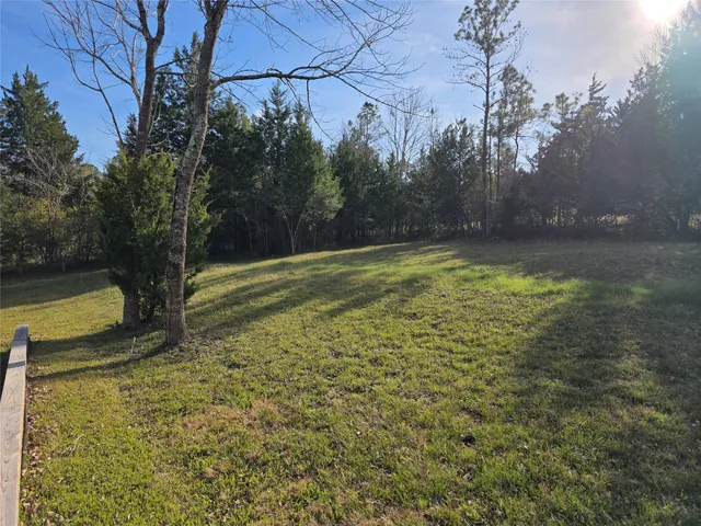 a view of a yard with an outdoor space