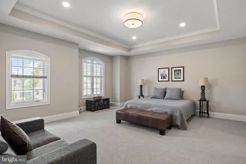 a bedroom with a bed and furniture