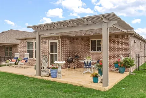 a view of a house with patio
