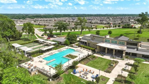an aerial view of a house with a garden