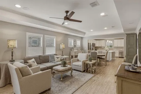 a living room with furniture and a table