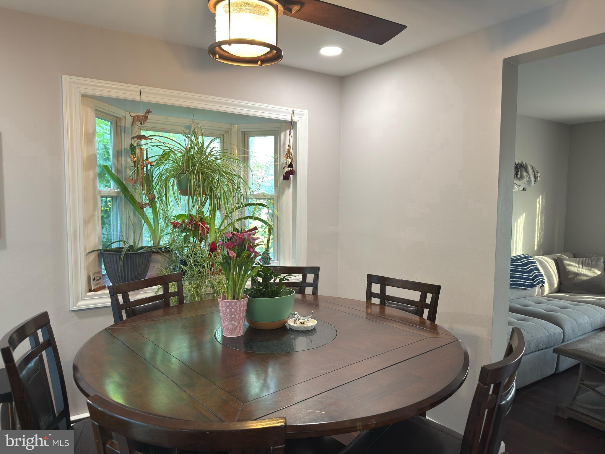 31 Bordentown Chesterfield Road Chesterfield, NJ 08515 - Photo 9 of 55 a view of a dining room with furniture a chandelier and large windows