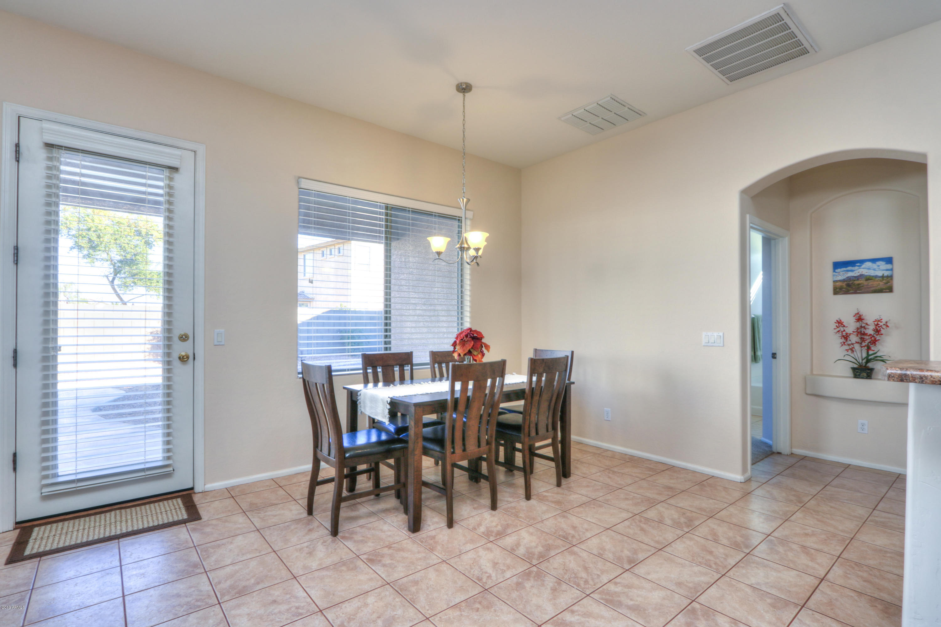 43908 Roth Road Maricopa, AZ 85138 - Photo 17 of 52 Dining w: New Lighting Fixture
