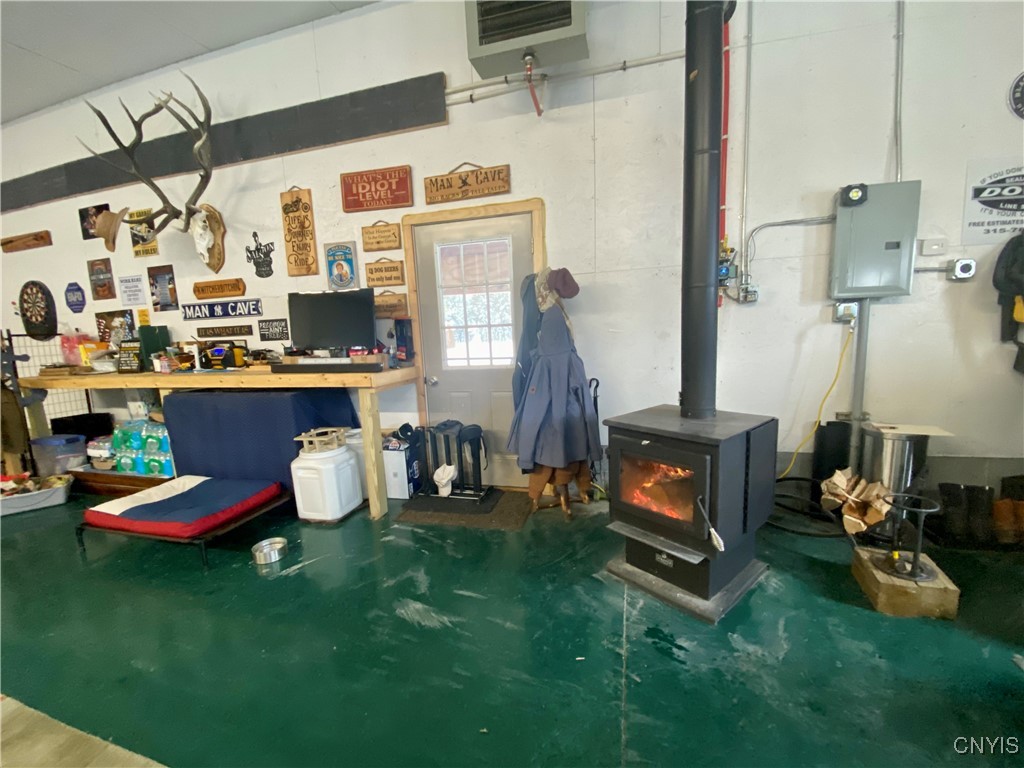 8805 Lane Road Ellisburg, NY 13650 - Photo 47 of 49 heated garage and entrance to the screened room