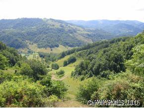 a view of mountains and valleys