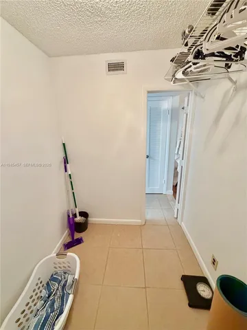 a bathroom with a sink a vanity and a mirror