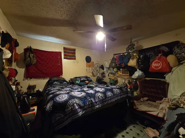 a room with lots of different colored cloths