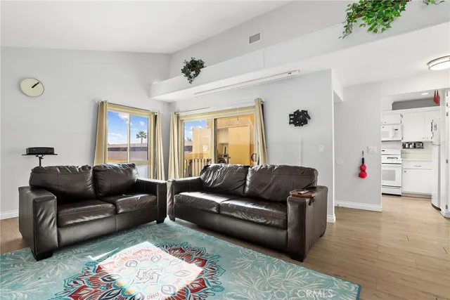 a living room with furniture and a couch