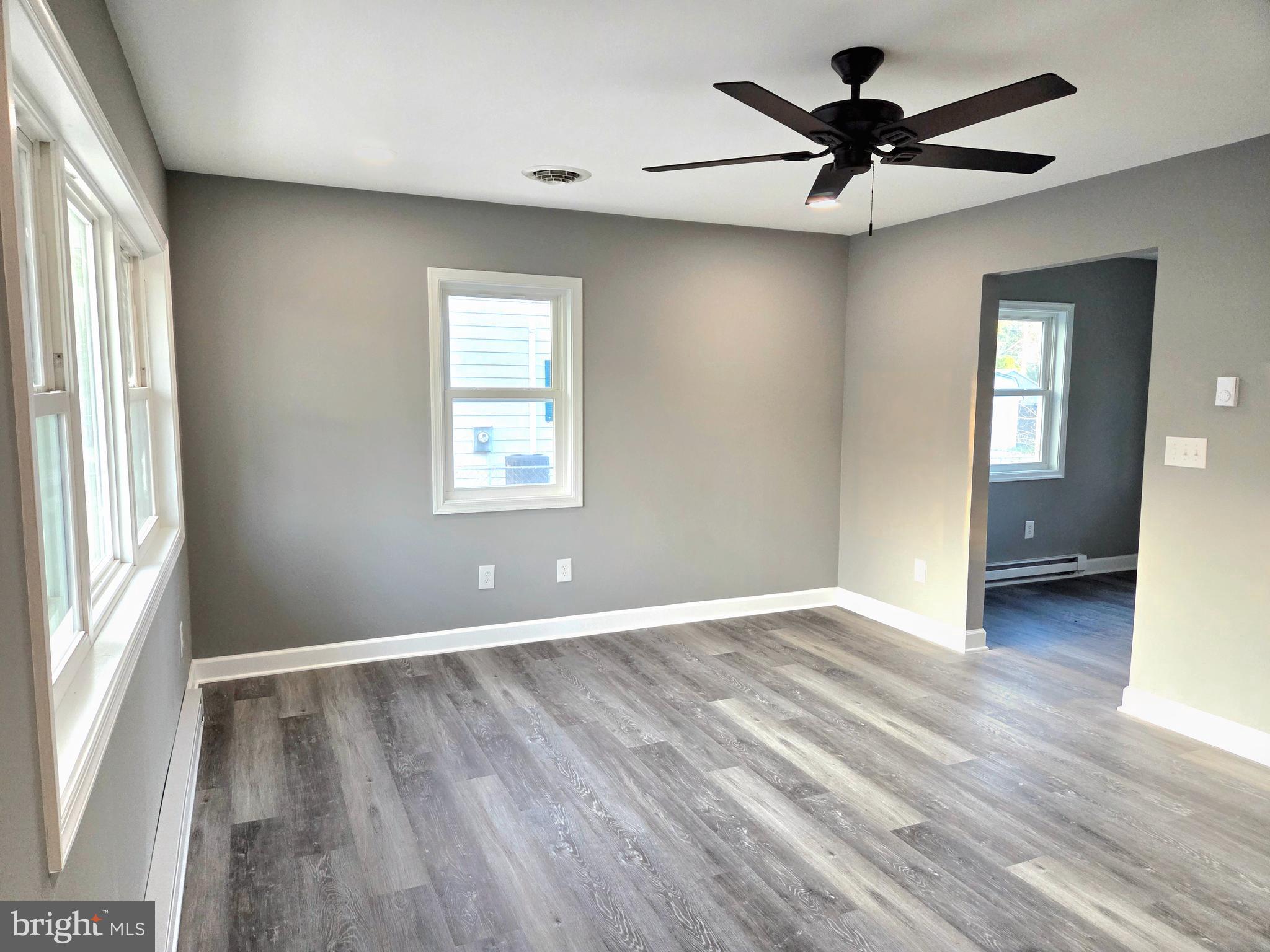 105 Goodwill Avenue Secretary, MD 21664 - Photo 13 of 24 wooden floor in an empty room with a window