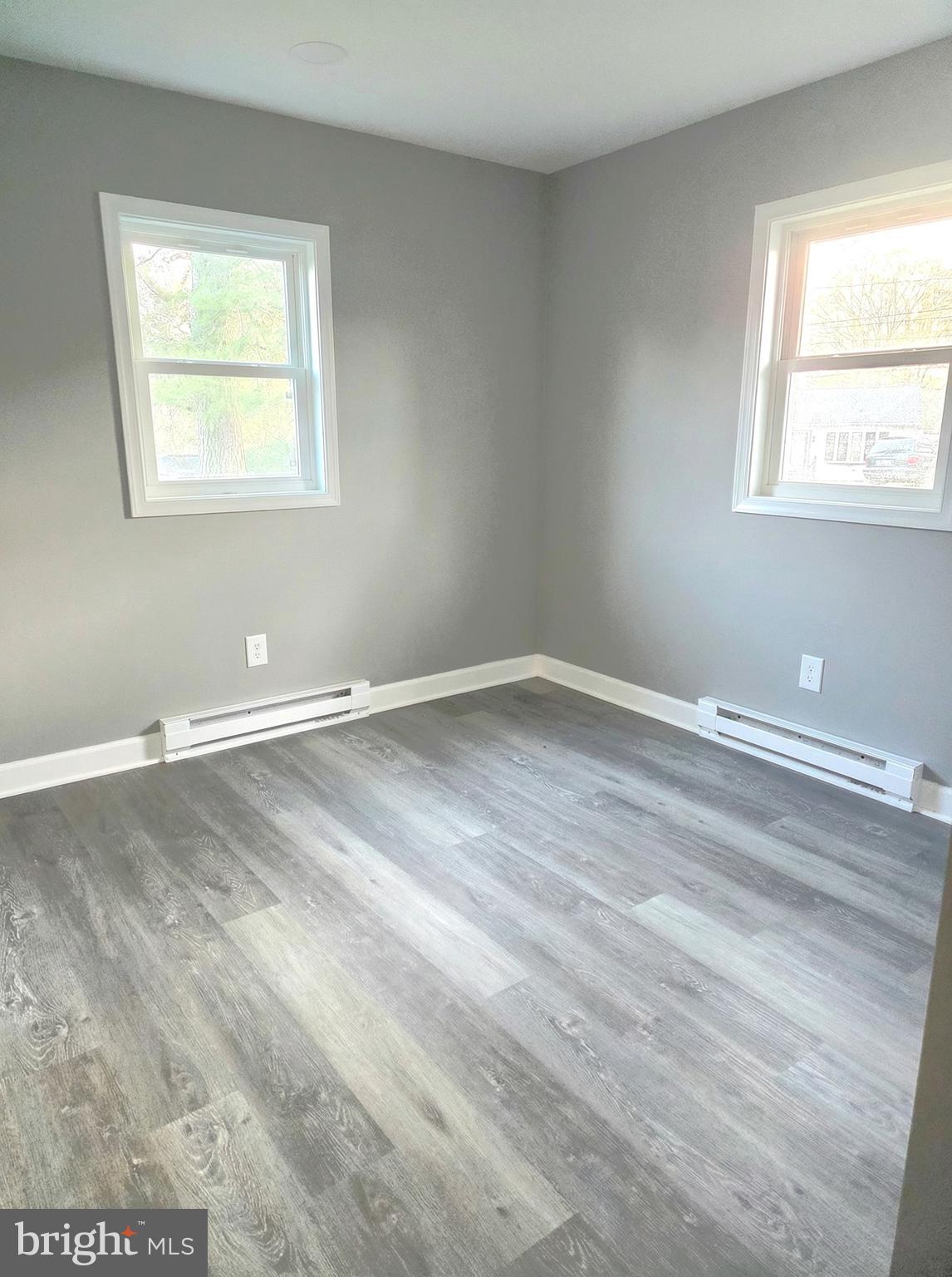 105 Goodwill Avenue Secretary, MD 21664 - Photo 16 of 24 a view of a room with wooden floor and a window
